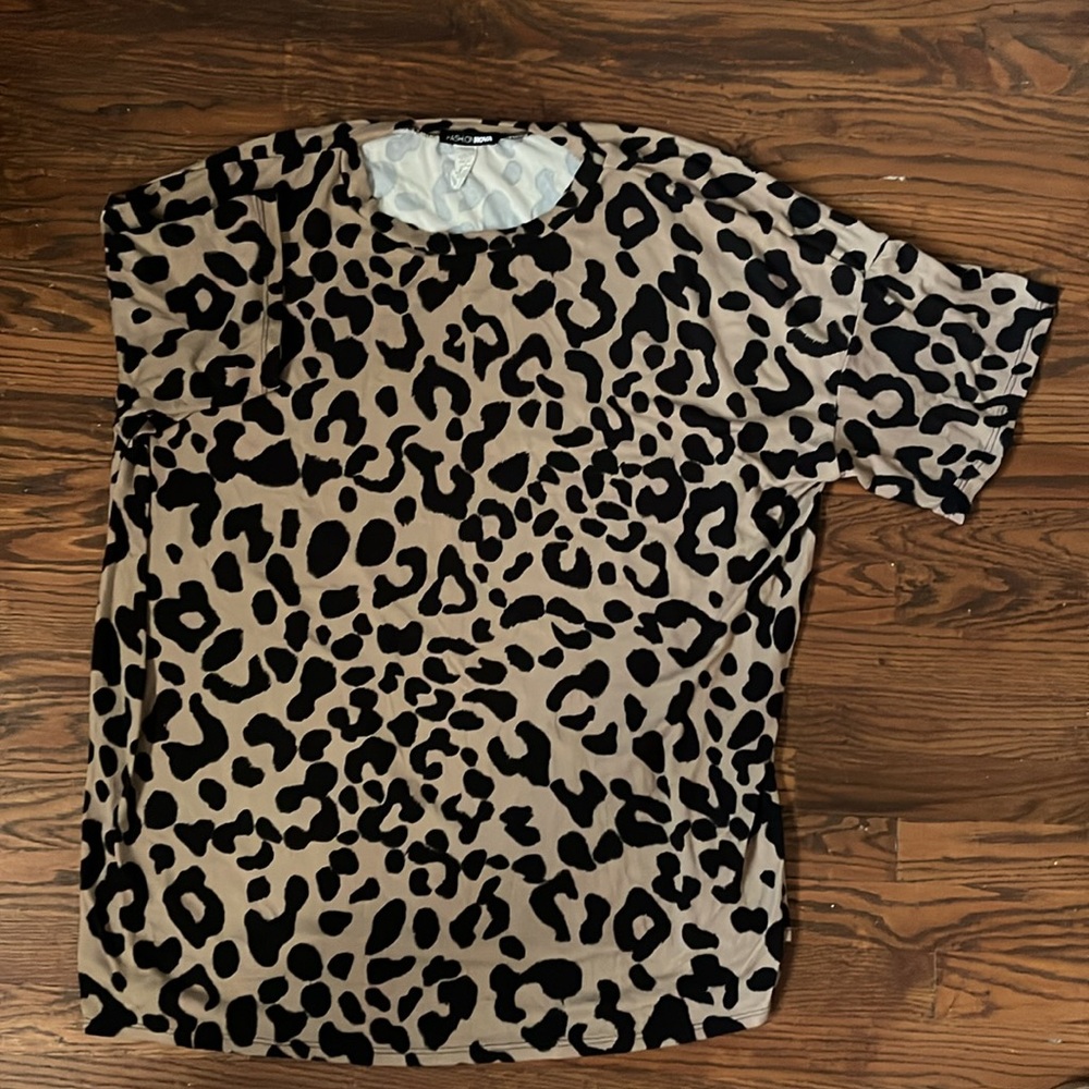 Fashion Nova (3) outfits size (XL) Camo, leopard, and charcoal grey.